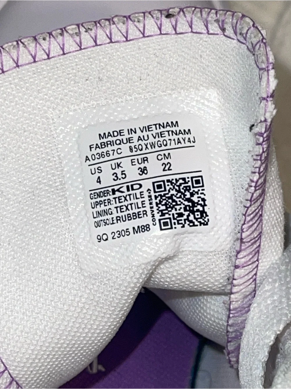 Converse High Top Sneakers in White with Purple Star Accent